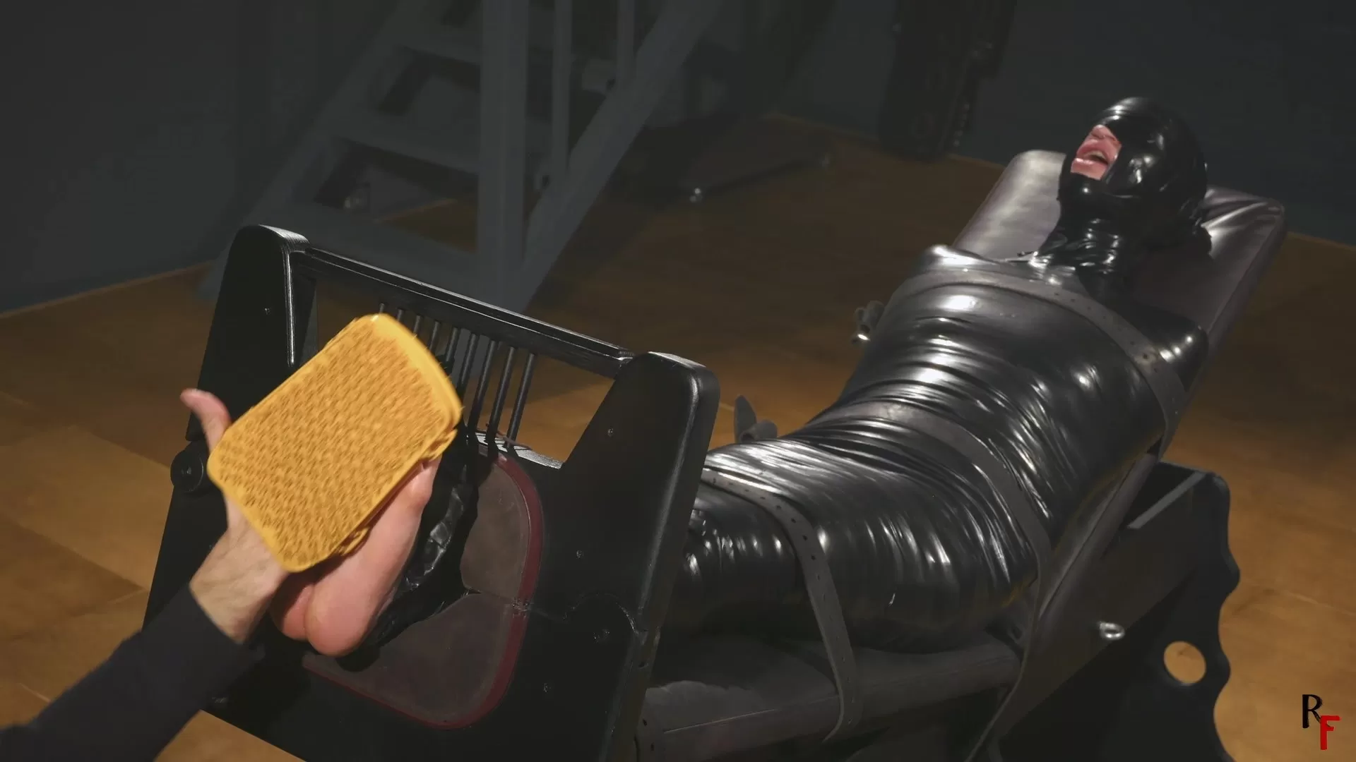 RFStudioProduction – Brittany in Tight PVC Mummification Part 3 – Foot Ticklin.webp
